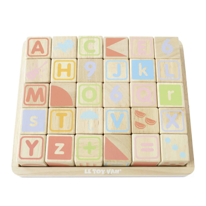 Lernwürfel mit Zahlen, Buchstaben und Motiven